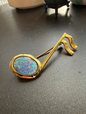 Gold Tone Musical Note Pin Brooch with Iridescent Opal-Like Center